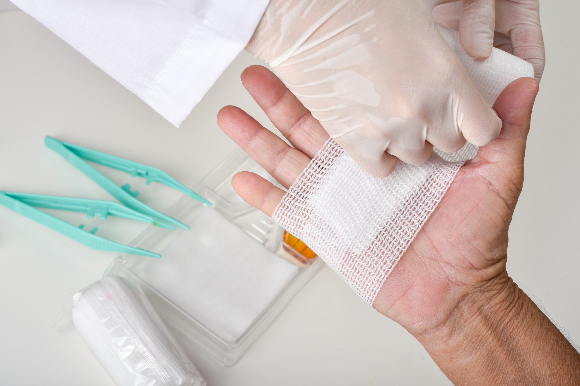 doctor-doing-wound-dressing-care-bandaging-patient39s-hand-hand-surgery-treatment-nurse-treat-patient39s-finger-injury-hospital